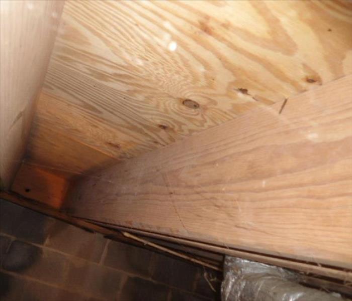 The floor joist showing cleaned after media blasting